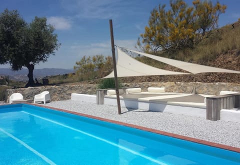 Property building, Living room, Swimming pool