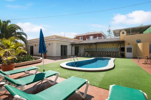 Property building, Living room, Swimming pool