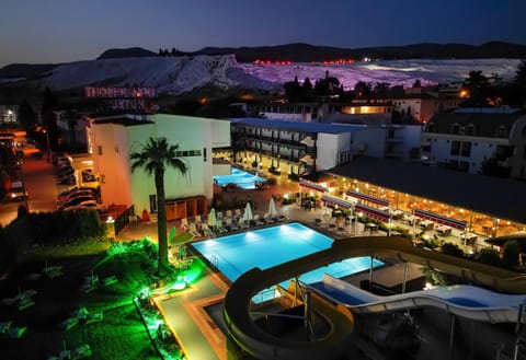 Property building, Night, Natural landscape, Bird's eye view, Mountain view, Pool view, sunbed