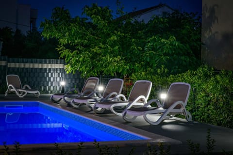 Night, Pool view, Swimming pool, sunbed