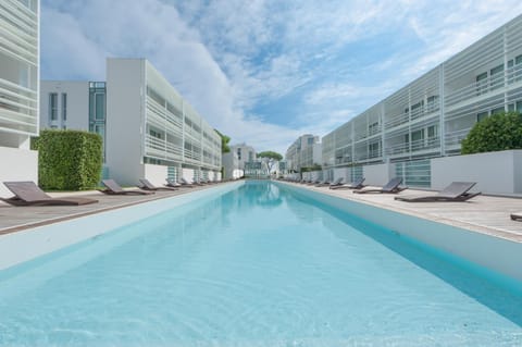 Property building, Pool view, Swimming pool, sunbed