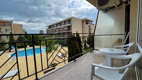 Property building, Patio, Day, View (from property/room), Balcony/Terrace, Pool view, Swimming pool, sunbed