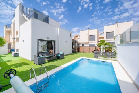 Property building, Living room, Swimming pool
