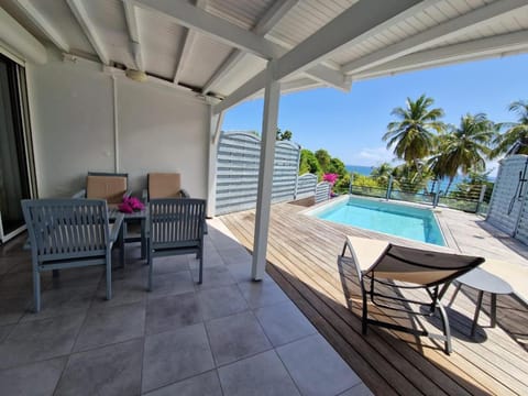 Patio, Seating area, Pool view, Sea view, Swimming pool, sunbed