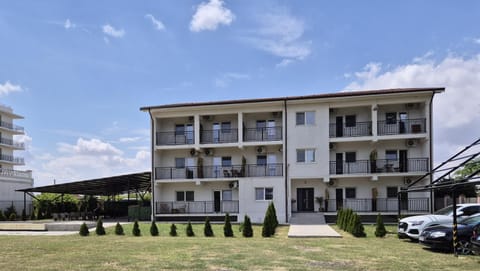 Property building, Facade/entrance, Day, Parking