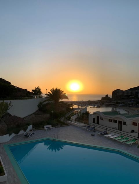 Property building, Nearby landmark, Day, Natural landscape, Beach, Pool view, Sea view, Swimming pool, Sunset
