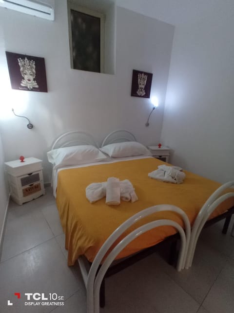 Photo of the whole room, Bedroom, towels, air conditioner