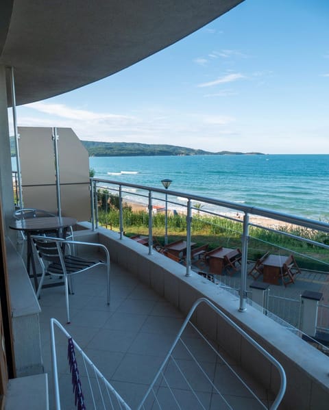View (from property/room), Balcony/Terrace, Seating area, Beach, Sea view