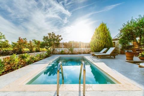 Natural landscape, Garden, Garden view, Swimming pool, sunbed