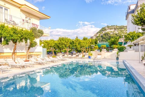 Property building, Day, Natural landscape, Swimming pool, Swimming pool, sunbed