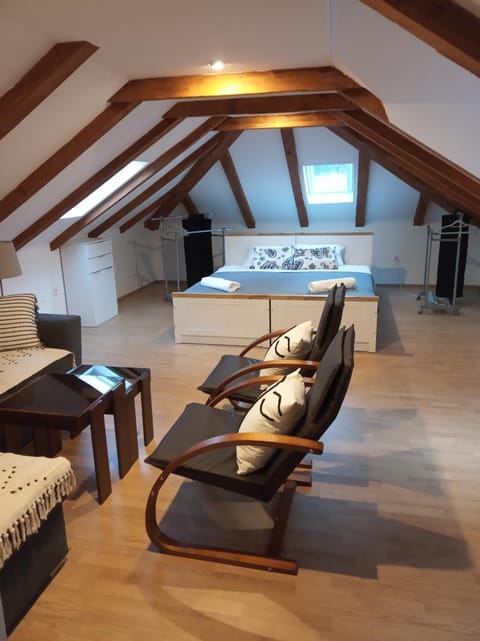 Bed, Seating area, Bedroom