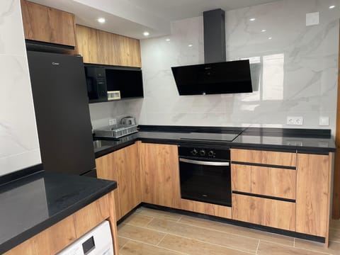 Kitchen or kitchenette, oven, stove