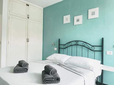 Bed, Photo of the whole room, Bedroom, towels, wardrobe