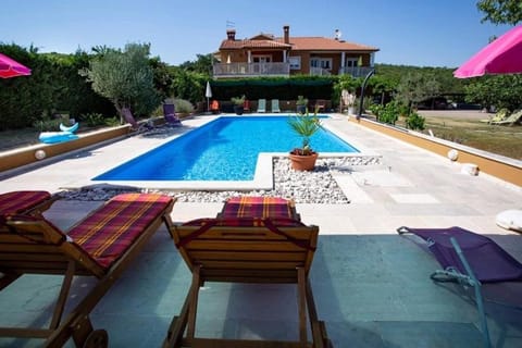 Property building, Patio, Day, Natural landscape, Summer, Garden, Garden, Balcony/Terrace, Beach, Garden view, Pool view, Swimming pool, sunbed