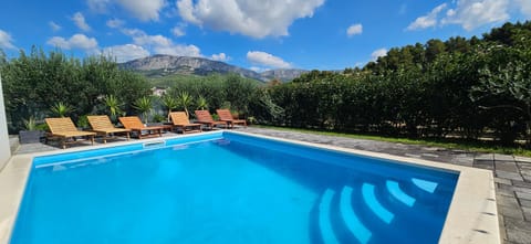 Natural landscape, Mountain view, Swimming pool, sunbed
