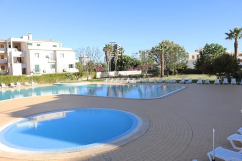 Property building, Patio, Spring, People, Winter, Summer, Pool view, Swimming pool, Time of day, children, group of guests, Family, Inner courtyard view, sunbed