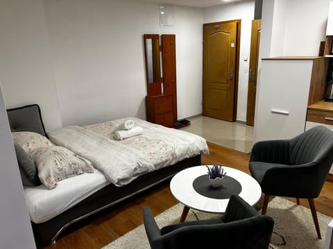 Bed, Seating area, Bedroom