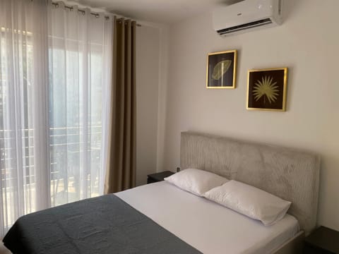 Bed, air conditioner