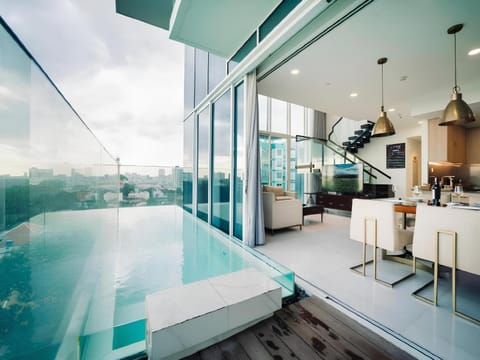 Patio, Natural landscape, Living room, Seating area, Pool view, Swimming pool, sunbed