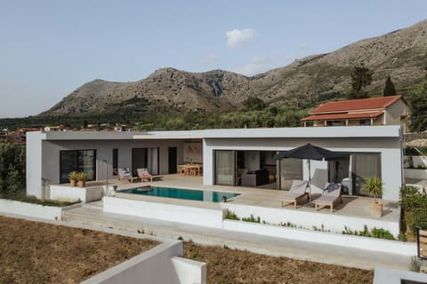 Property building, Patio, Swimming pool, sunbed