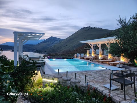 Property building, Natural landscape, Pool view, Swimming pool, sunbed