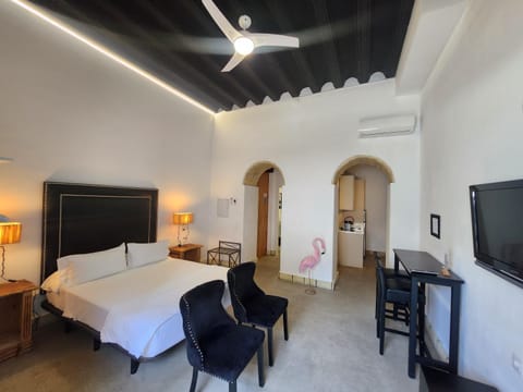 Bed, Seating area, Bedroom
