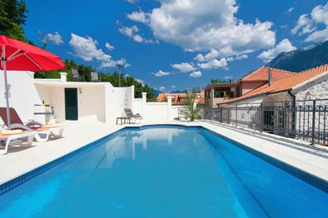 Swimming pool, sunbed