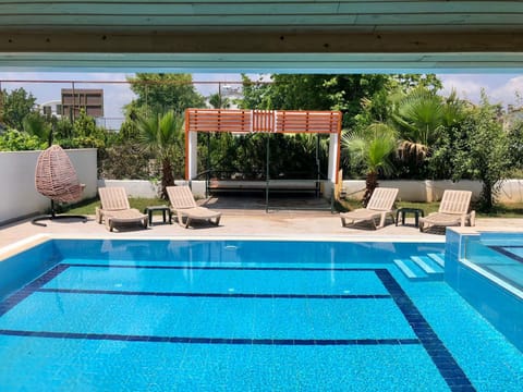 Patio, Day, Pool view, Swimming pool, sunbed