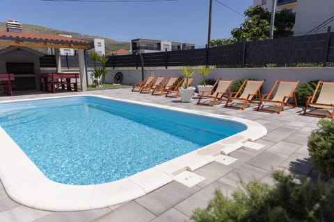 Swimming pool, sunbed