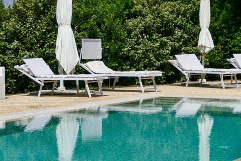 Swimming pool, sunbed
