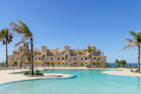 Property building, Day, Natural landscape, Beach, Sea view, Swimming pool, sunbed