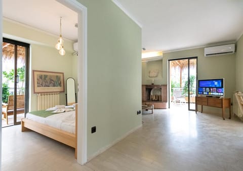 Facade/entrance, Bed, TV and multimedia, Living room, Photo of the whole room, Bedroom
