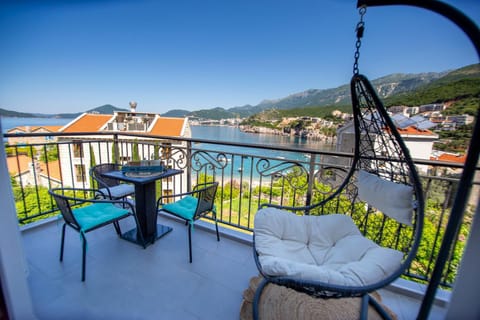 Property building, Day, Natural landscape, View (from property/room), Balcony/Terrace, Living room, Seating area, Dining area, Mountain view, Sea view, Swimming pool