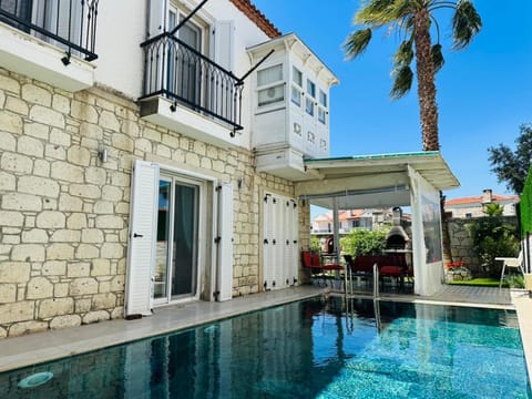 Property building, Patio, Day, Pool view, Swimming pool