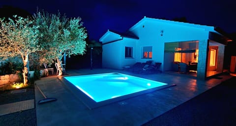 Property building, Patio, Night, Natural landscape, Garden view, Swimming pool, sunbed