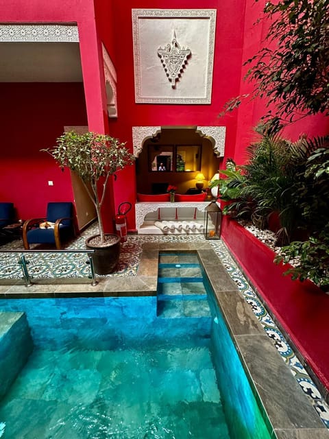 Living room, Decorative detail, Seating area, Pool view, Swimming pool