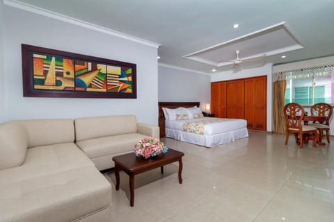 Bed, Living room, Seating area, Bedroom
