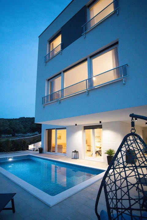 Property building, Patio, View (from property/room), Pool view, Swimming pool, Sunset, sunbed