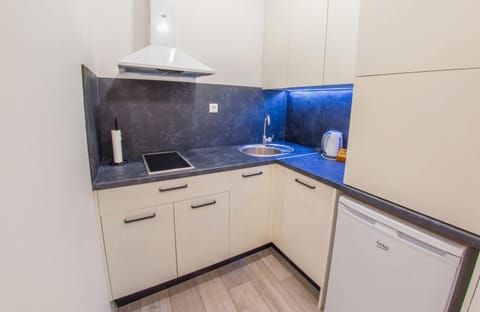 Kitchen or kitchenette, stove