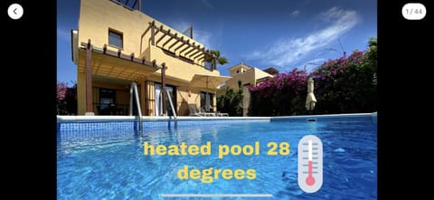 Property building, Property logo or sign, Swimming pool