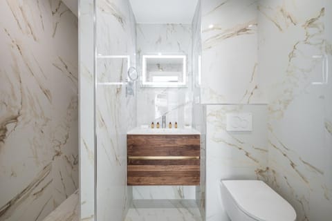 Shower, Toilet, Property logo or sign, Hot Spring Bath, Bathroom