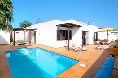 Property building, Living room, Swimming pool