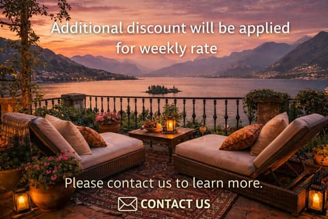 The Ortensia, our Room with Lake View, Spacious Park-Facing Balcony and Private External Bathroom at the Villa Isabella Stresa Bed and Breakfast in Stresa