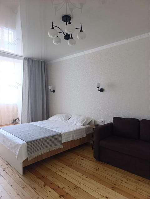 Bed, Seating area, Bedroom