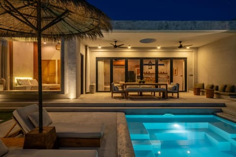 Patio, Night, Seating area, Pool view, Swimming pool, sunbed
