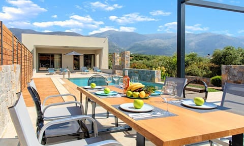 Patio, Day, Natural landscape, View (from property/room), Balcony/Terrace, Living room, Seating area, Dining area, Mountain view, Pool view, Swimming pool, sunbed