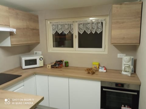 Kitchen or kitchenette, microwave, oven, toaster