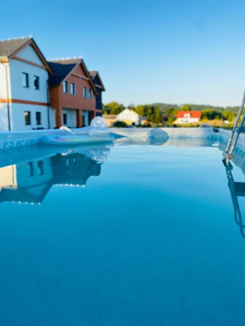 Property building, Day, Natural landscape, Pool view, Swimming pool, Swimming pool