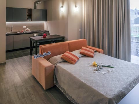 Kitchen or kitchenette, Living room, Seating area, Dining area