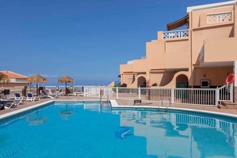 Property building, Day, View (from property/room), Balcony/Terrace, Pool view, Swimming pool, sunbed